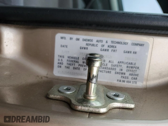 2007 Suzuki Forenza z VIN KL5JD56Z07K657218, wystawiony jako Copart lot #86767854 z przebiegiem 93 044 mil mil oraz Szkoda całkowita • Salvage title. Historia ofert i sprzedaży dostępna na DreamBid. Obrazek 12.