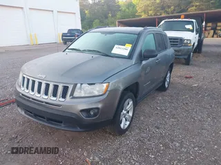 2011 Jeep Compass Latitude with VIN 1J4NT1FB4BD260158, listed as a IAAI auction lot 42013286 with 326,493 mi miles. Bid and sale history available at carsss.com. Image 2.