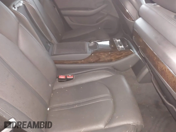 2012 Audi A8 with VIN WAUAVAFD9CN006499, listed as a IAAI auction lot 42461402 with 57,232 mi miles and . Bid and sale history available at DreamBid. Image 8.