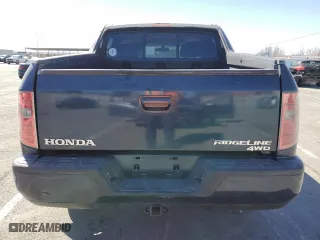 2010 Honda Ridgeline RTL with VIN 5FPYK1F54AB002253, listed as a Copart auction lot 49992265 with 192,841 mi miles and Salvage Title. Bid and sale history available at carsss.com. Image 6.