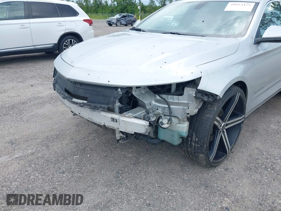 2017 Chevrolet Impala LT with VIN 2G1105SA0H9159893, listed as a IAAI auction lot 39953475 with 136,212 mi miles and . Bid and sale history available at DreamBid. Image 6.