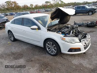 2009 Volkswagen CC Sport with VIN WVWML73C79E566552, listed as a IAAI auction lot 41231328 with 130,288 mi miles. Bid and sale history available at carsss.com. Image 1.