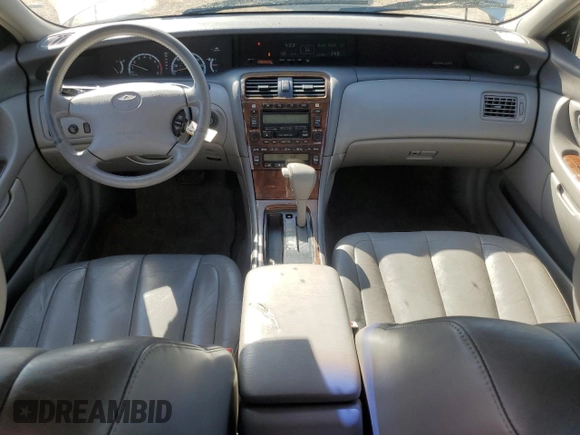 2000 Toyota Avalon XL with VIN 4T1BF28B5YU031947, listed as a Copart auction lot 56239265 with 167,627 mi miles and Salvage title. Bid and sale history available at DreamBid. Image 8.