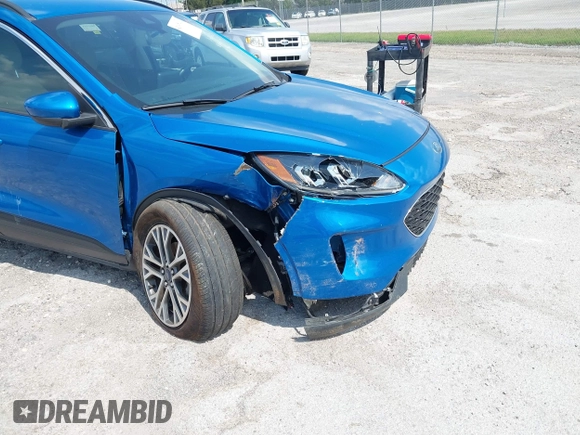 2020 Ford Escape SEL with VIN 1FMCU0H60LUB45316, listed as a IAAI auction lot 42007949 with 58,560 mi miles and . Bid and sale history available at carsss.com. Image 6.