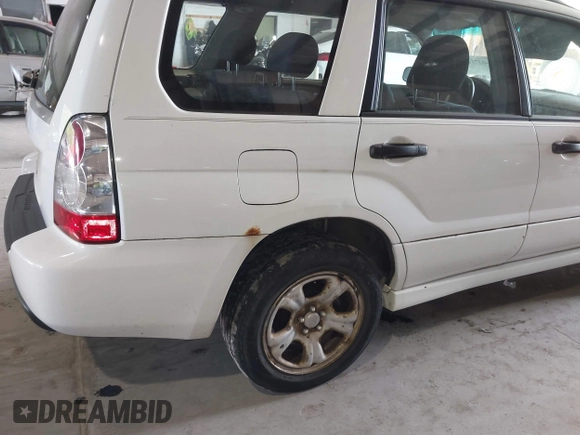 2007 Subaru Forester X with VIN JF1SG63637H736844, listed as a IAAI auction lot 40371482 with 166,328 mi miles. Bid and sale history available at carsss.com. Image 12.