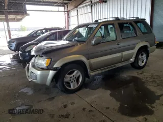 2001 Infiniti QX4 with VIN JNRDR09X21W204448, listed as a Copart auction lot 82619574 with 114,520 mi miles and Salvage Title. Bid and sale history available at DreamBid. Image 1.