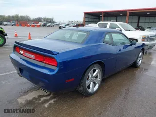 2009 Dodge Challenger R/T with VIN 2B3LJ54T19H526417, listed as a IAAI auction lot 41893522 with 70,009 mi miles. Bid and sale history available at carsss.com. Image 4.