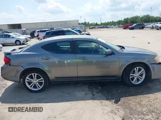 2012 Dodge Avenger SXT with VIN 1C3CDZCB9CN212328, listed as a IAAI auction lot 42360745 with 189,311 mi miles and . Bid and sale history available at DreamBid. Image 13.