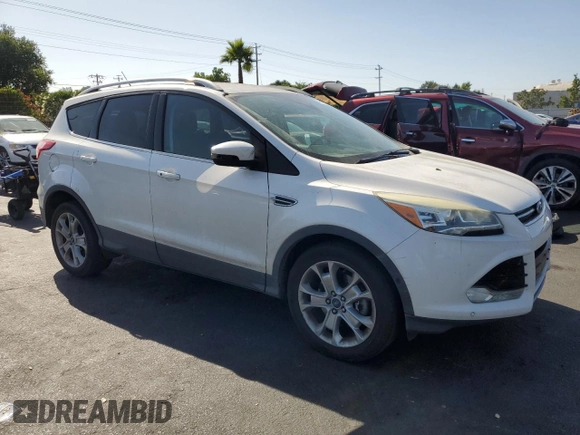 2014 Ford Escape Titanium z VIN 1FMCU0J9XEUD01904, wystawiony jako Copart lot #61819555 z przebiegiem 217 794 mil mil oraz Czysty tytuł • Clean title. Historia ofert i sprzedaży dostępna na DreamBid. Obrazek 4.