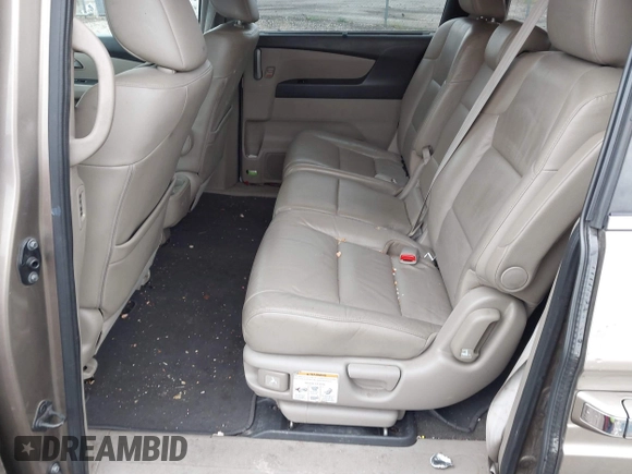 2012 Honda Odyssey EX-L with VIN 5FNRL5H68CB031930, listed as a IAAI auction lot 42222501 with 65,262 mi miles and . Bid and sale history available at DreamBid. Image 8.
