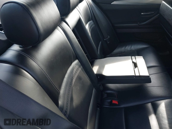 2015 BMW 5 Series 535i xDrive with VIN WBA5B3C56FD540699, listed as a IAAI auction lot 41128002 with 97,726 mi miles and . Bid and sale history available at DreamBid. Image 8.