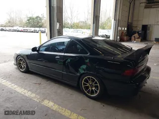 1999 Acura Integra GS-R with VIN JH4DC2397XS001674, listed as a IAAI auction lot 41857042 with 205,494 mi miles. Bid and sale history available at carsss.com. Image 3.