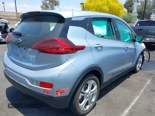 2018 Chevrolet Bolt EV LT with VIN 1G1FW6S07J4134662, listed as a IAAI auction lot 42386790 with 62,944 mi miles and . Bid and sale history available at DreamBid. Image 4.