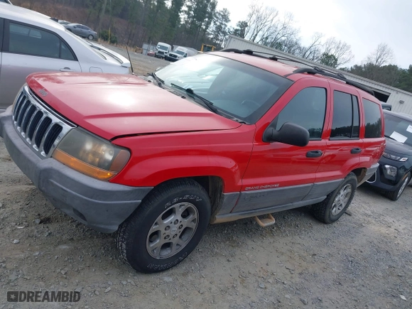 1999 Jeep Grand Cherokee Laredo with VIN 1J4GW58S0XC519908, listed as a IAAI auction lot 41789905 with 221,064 mi miles. Bid and sale history available at carsss.com. Image 15.