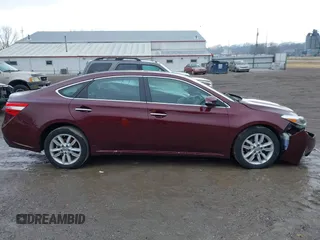 2015 Toyota Avalon Limited with VIN 4T1BK1EB8FU160935, listed as a IAAI auction lot 41487381 with 105,273 mi miles and . Bid and sale history available at DreamBid. Image 13.