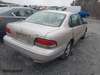 1997 Toyota Avalon XL with VIN 4T1BF12B1VU198756, listed as a IAAI auction lot 41613887 with 217,863 mi miles. Bid and sale history available at carsss.com. Image 4.