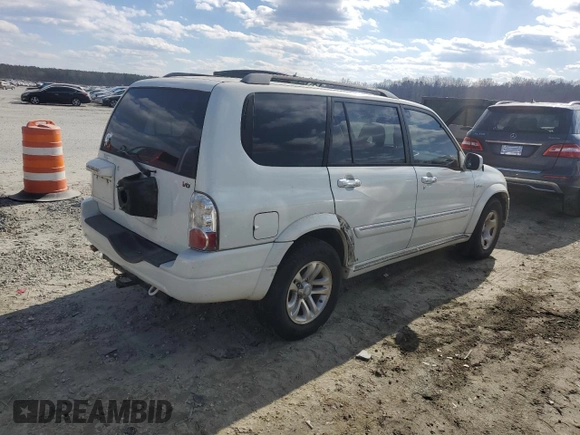 2005 Suzuki XL7 LX z VIN JS3TY92V454103877, wystawiony jako Copart lot #42440705 z przebiegiem 216 557 mil mil oraz Szkoda całkowita • Salvage title. Historia ofert i sprzedaży dostępna na DreamBid. Obrazek 3.