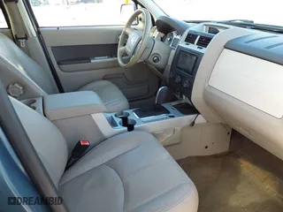 2010 Mercury Mariner Premier with VIN 4M2CN8HG7AKJ29786, listed as a IAAI auction lot 41323378 with 126,592 mi miles. Bid and sale history available at carsss.com. Image 5.