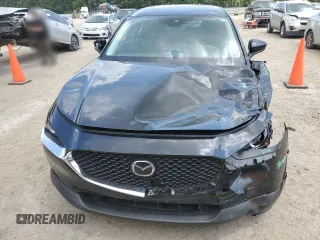 2023 Mazda CX-30 S with VIN 3MVDMBAM6PM513651, listed as a Copart auction lot 57432955 with 49,851 mi miles and Salvage title. Bid and sale history available at DreamBid. Image 5.