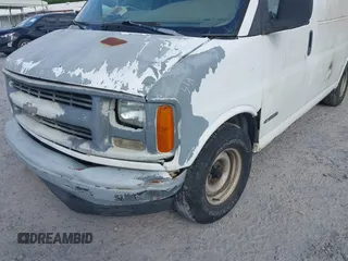 1998 Chevrolet Chevy Van z VIN 1GCFG15WXW1013981, wystawiony jako IAAI lot #42067738 z przebiegiem 265 287 mil mil oraz . Historia ofert i sprzedaży dostępna na DreamBid. Obrazek 6.
