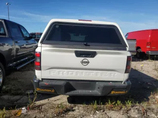 2024 Nissan Frontier S with VIN 1N6ED1CL8RN635597, listed as a Copart auction lot 69277294 with 7,927 mi miles and Salvage Title. Bid and sale history available at carsss.com. Image 6.