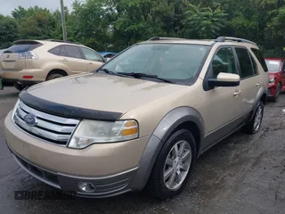 2008 Ford Taurus X SEL z VIN 1FMDK02W98GA29752, wystawiony jako IAAI lot #42485318 z przebiegiem 234 259 mil mil oraz . Historia ofert i sprzedaży dostępna na DreamBid. Obrazek 2.
