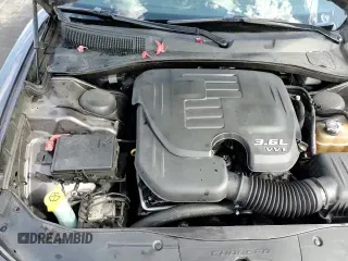 2018 Dodge Charger SXT Plus with VIN 2C3CDXHGXJH200896, listed as a Copart auction lot 81780855 with 115,866 mi miles and Salvage title. Bid and sale history available at DreamBid. Image 15.