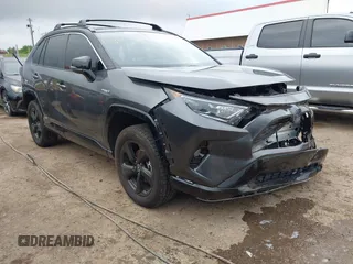 2021 Toyota RAV4 Hybrid XSE with VIN 4T3E6RFV0MU059367, listed as a IAAI auction lot 42209823 with 74,800 mi miles and . Bid and sale history available at DreamBid. Image 1.
