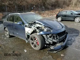 2012 Porsche Cayenne Turbo z VIN WP1AC2A29CLA83629, wystawiony jako Copart lot #83067994 z przebiegiem Nie podano mil oraz Szkoda całkowita • Salvage title. Historia ofert i sprzedaży dostępna na DreamBid. Obrazek 12.