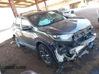 2021 Honda CR-V EX with VIN 7FARW2H52ME007979, listed as a IAAI auction lot 41666270 with 59,636 mi miles. Bid and sale history available at carsss.com. Image 1.