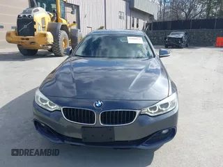 2016 BMW 4 Series 428i xDrive with VIN WBA4C9C56GG140427, listed as a IAAI auction lot 41886670 with 94,426 mi miles and . Bid and sale history available at carsss.com. Image 12.
