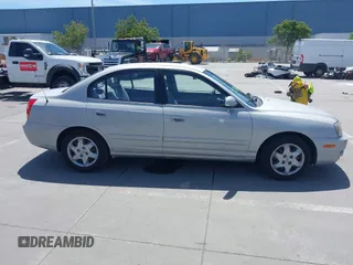 2004 Hyundai Elantra GLS z VIN KMHDN46D74U781436, wystawiony jako IAAI lot #42260519 z przebiegiem 132 943 mil mil oraz . Historia ofert i sprzedaży dostępna na DreamBid. Obrazek 13.