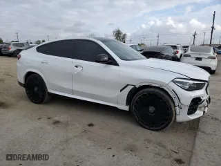 2022 BMW X6 M50i with VIN 5UXCY8C0XN9M57786, listed as a Copart auction lot 54755315 with 61,065 mi miles and Clean Title. Bid and sale history available at carsss.com. Image 4.