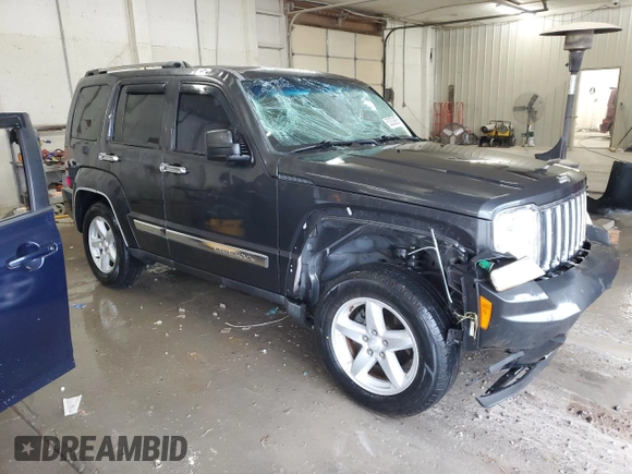 2011 Jeep Liberty Limited 70th Anniversary with VIN 1J4PN5GK4BW524055, listed as a Copart auction lot 52209065 with 184,692 mi miles and Salvage Title. Bid and sale history available at DreamBid. Image 4.