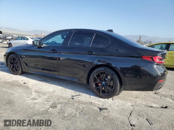 2023 BMW 5 Series 530e with VIN WBA13AG06PCM01727, listed as a Copart auction lot 83666424 with 40,831 mi miles and Salvage title. Bid and sale history available at DreamBid. Image 2.