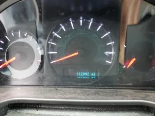 2012 Ford Fusion SEL z VIN 3FAHP0JA3CR156338, wystawiony jako Copart lot #51996885 z przebiegiem 162 892 mil mil oraz Szkoda całkowita • Salvage title. Historia ofert i sprzedaży dostępna na DreamBid. Obrazek 9.