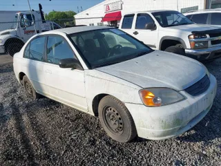 2003 Honda Civic LX with VIN 1HGES16523L014348, listed as a IAAI auction lot 42015881 with 271,832 mi miles. Bid and sale history available at carsss.com. Image 1.