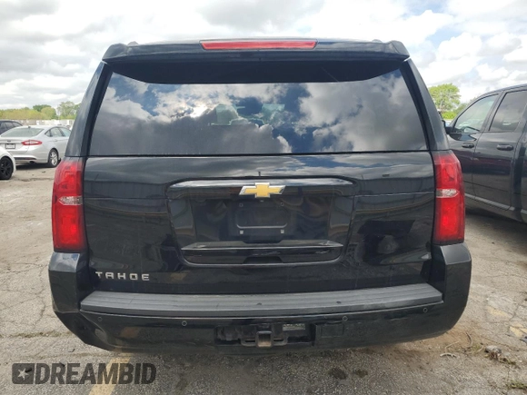 2017 Chevrolet Tahoe LT z VIN 1GNSKBKCXHR140366, wystawiony jako Copart lot #56527295 z przebiegiem Nie podano mil oraz Szkoda całkowita • Salvage title. Historia ofert i sprzedaży dostępna na DreamBid. Obrazek 6.