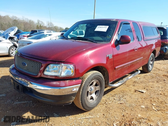 2003 Ford F-150 XL with VIN 1FTRX17W43NA07186, listed as a IAAI auction lot 41864354 with 123,565 mi miles. Bid and sale history available at carsss.com. Image 17.