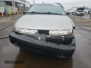 1996 Saturn SL with VIN 1G8ZK5272TZ265571, listed as a Copart auction lot 51267475 with 142,824 mi miles and Salvage Title. Bid and sale history available at carsss.com. Image 5.