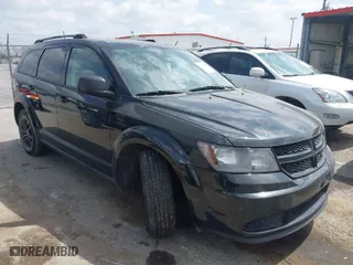 2018 Dodge Journey SE with VIN 3C4PDCAB6JT443844, listed as a IAAI auction lot 41745969 with 148,557 mi miles. Bid and sale history available at carsss.com. Image 1.