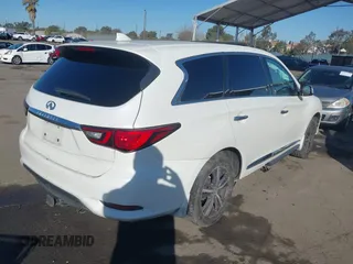 2019 Infiniti QX60 LUXE with VIN 5N1DL0MN9KC515168, listed as a IAAI auction lot 41354634 with 84,173 mi miles. Bid and sale history available at carsss.com. Image 4.