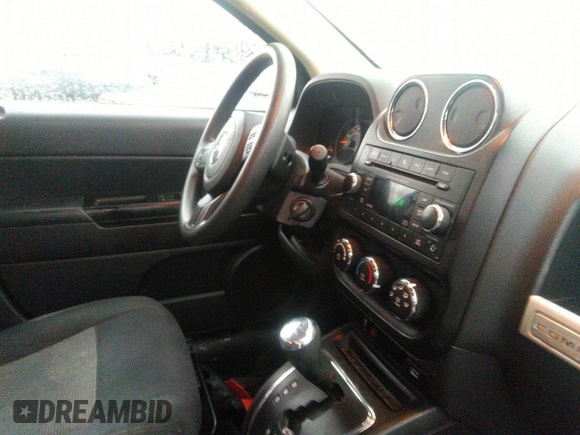 2016 Jeep Compass Sport with VIN 1C4NJDBB0GD520971, listed as a IAAI auction lot 41931731 with 124,038 mi miles and . Bid and sale history available at carsss.com. Image 5.