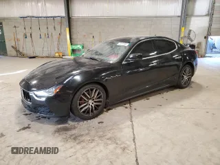 2015 Maserati Ghibli S Q4 z VIN ZAM57RTAXF1139366, wystawiony jako Copart lot #75391994 z przebiegiem 84 732 mil mil oraz Szkody całkowita. Historia ofert i sprzedaży dostępna na DreamBid. Obrazek 1.
