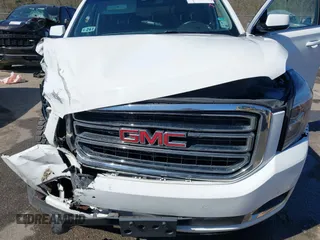 2019 GMC Yukon XL SLT with VIN 1GKS1GKC0KR330715, listed as a IAAI auction lot 41758626 with 134,641 mi miles. Bid and sale history available at carsss.com. Image 10.