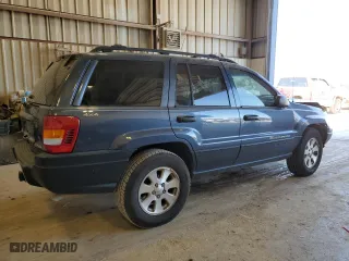 2001 Jeep Grand Cherokee Laredo with VIN 1J4GW48N41C557380, listed as a Copart auction lot 74080604 with 58,005 mi miles and Salvage Title. Bid and sale history available at carsss.com. Image 3.