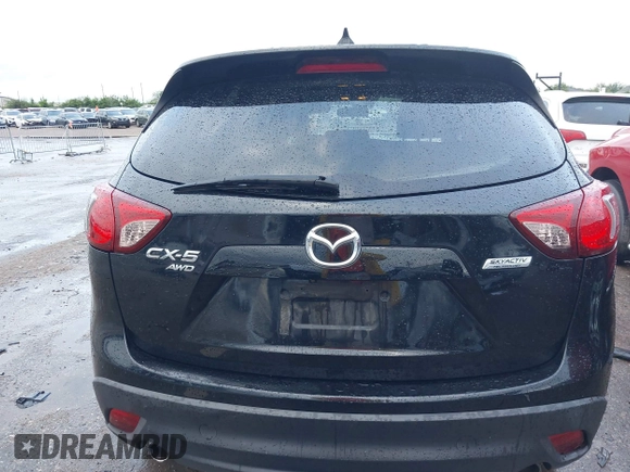 2016 Mazda CX-5 Grand Touring z VIN JM3KE4DY9G0605489, wystawiony jako IAAI lot #42085160 z przebiegiem 160 338 mil mil oraz . Historia ofert i sprzedaży dostępna na DreamBid. Obrazek 16.