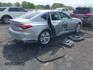 2021 Acura TLX Technology z VIN 19UUB6F41MA002737, wystawiony jako IAAI lot #41925713 z przebiegiem 28 599 mil mil oraz . Historia ofert i sprzedaży dostępna na DreamBid. Obrazek 4.