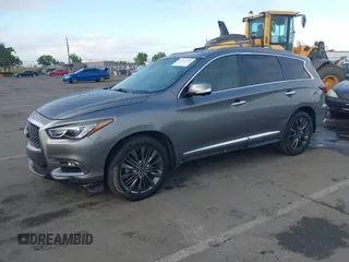 2019 Infiniti QX60 Pure z VIN 5N1DL0MN7KC522605, wystawiony jako IAAI lot #42257708 z przebiegiem 60 357 mil mil oraz . Historia ofert i sprzedaży dostępna na DreamBid. Obrazek 17.