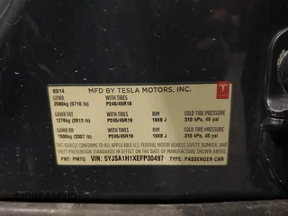 2014 Tesla Model S 60 with VIN 5YJSA1H1XEFP30497, listed as a IAAI auction lot 41294630 with 203,663 mi miles and . Bid and sale history available at DreamBid. Image 9.